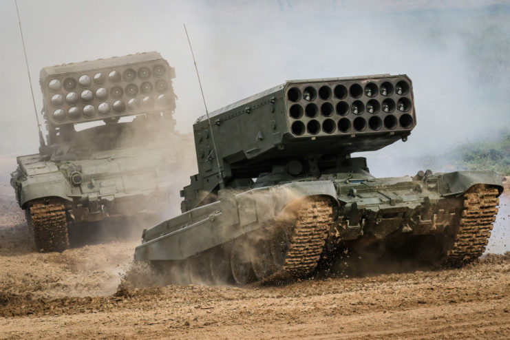 Two Russian Army TOS-1A multiple rocket launcher and thermobaric weapons mounted on a T-72 tank chassis.