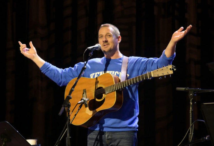 Sturgill Simpson performing on stage.