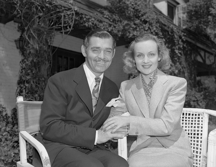 Clark Gable and Carole Lombard pose for a photo