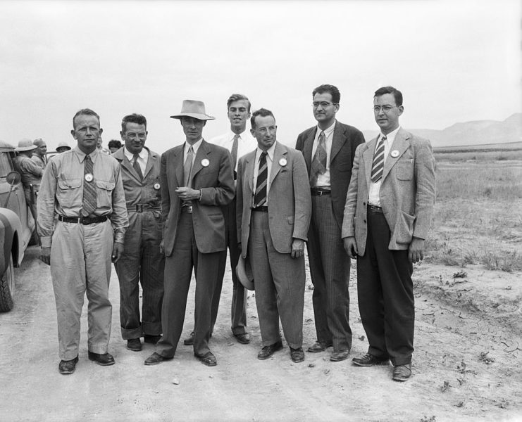 A Group of US scientists stand outside a testing site in New Mexico in the 1940s