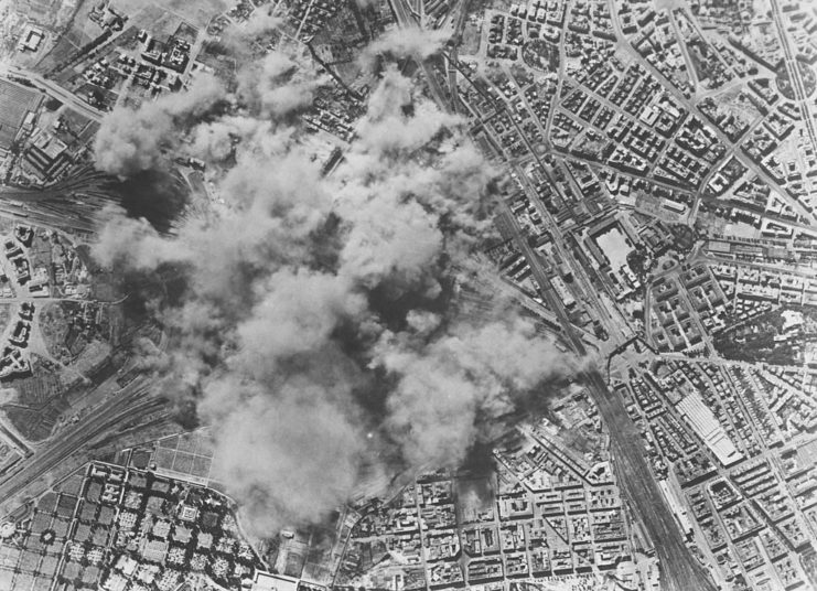 Smoke billows into the air during a bombing raid on Rome during World War II