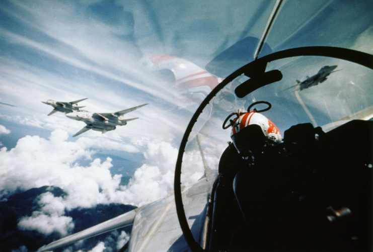 Two F-14A Tomcat aircraft as seen from the cockpit of another F-14.