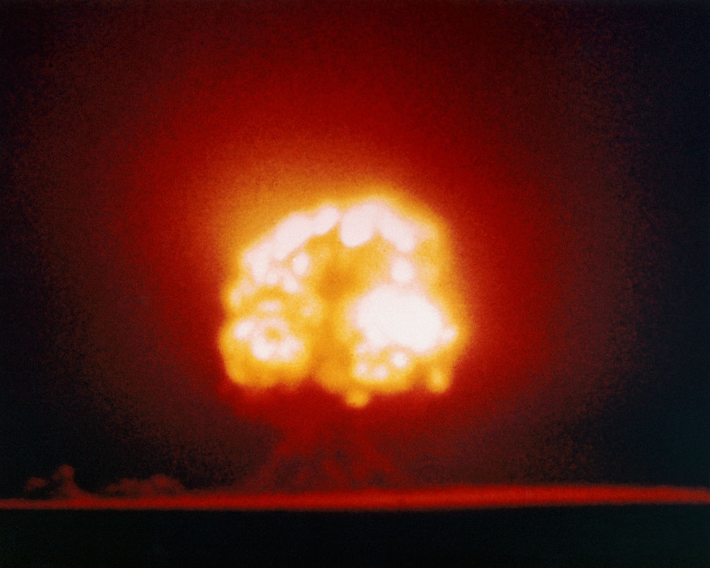 An atomic bomb explodes during the Trinity test in 1945