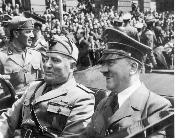 Hitler and Mussolini ride in a car in the 1940s 