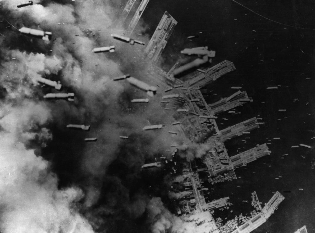 Japanese Ordnance Officials Disarm Unexploded WWIIEra Bomb at