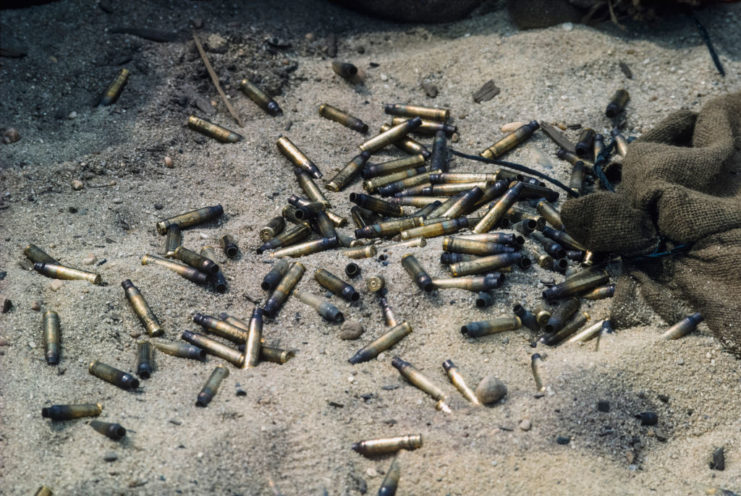 Spent shell casings in the sand