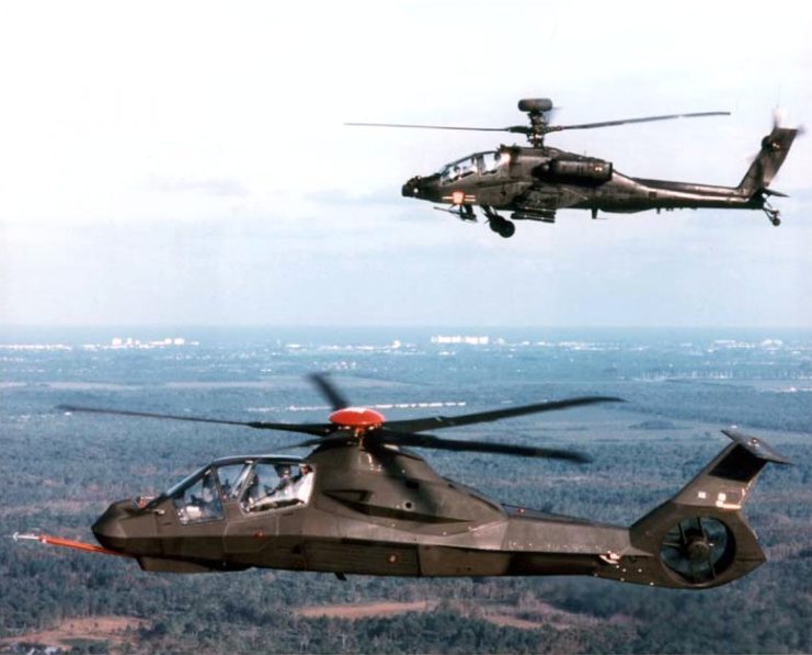 Photo of RAH-66 and AH-64 Apache mid-flight