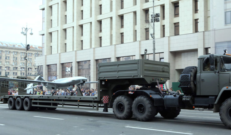 Military vehicle towing a Baykar Bayraktar TB2