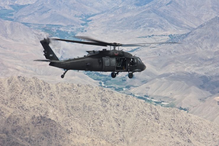 A UH-60 Black Hawk helicopter assigned to Task Force Eagle Assault, 5-101 Combat Aviation Brigade, flies over the rugged terrain of eastern Afghanistan, July 28, 2015.