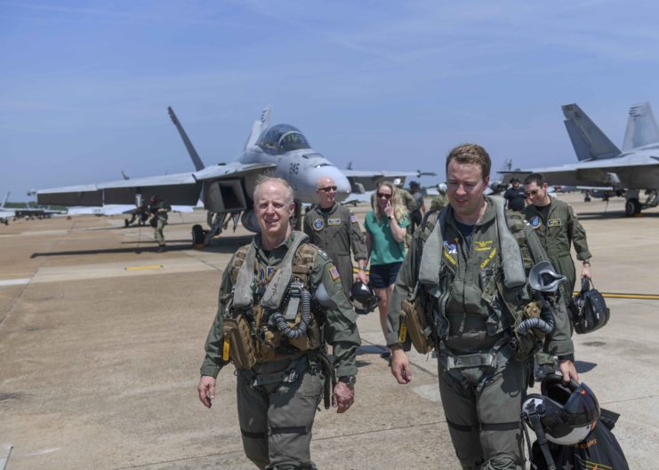 Adm. Daryl Caudle and Lt. Karl “Kramps” Knight walking on the tarmac