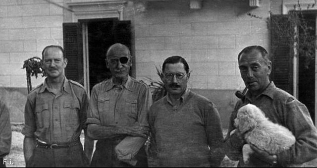 Adrian Carton de Wiart standing with John Combe, Michael Gambier-Parry and Edward Todhunter