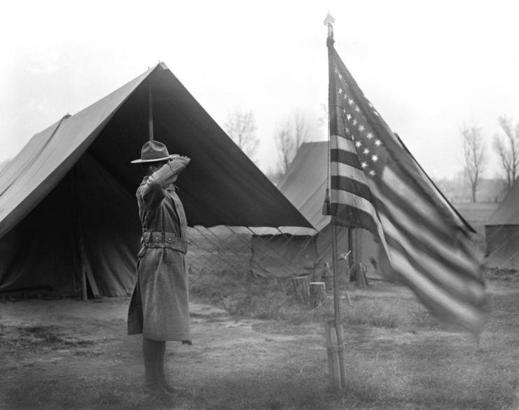 African-American soldier saluting the American flag