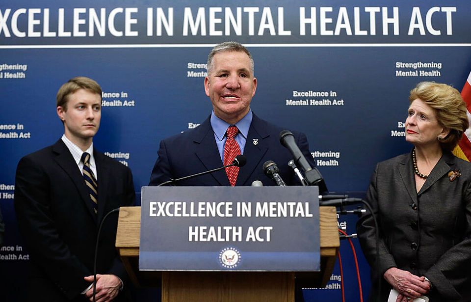 Justin Constantine speaking at a press conference