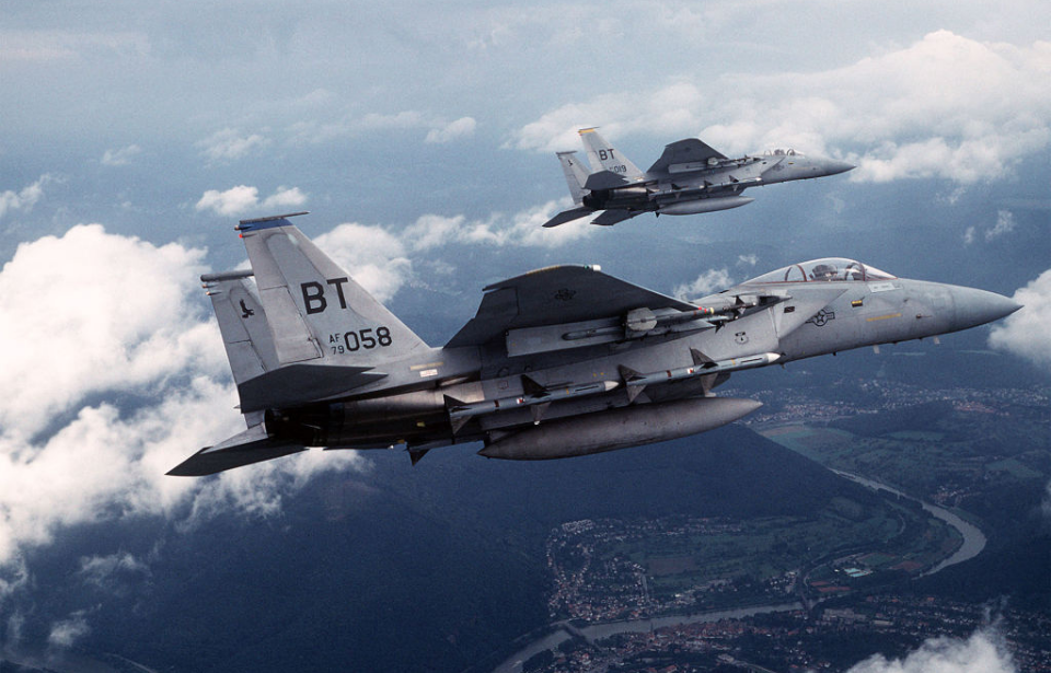 Two F-15C Eagle aircraft in flight