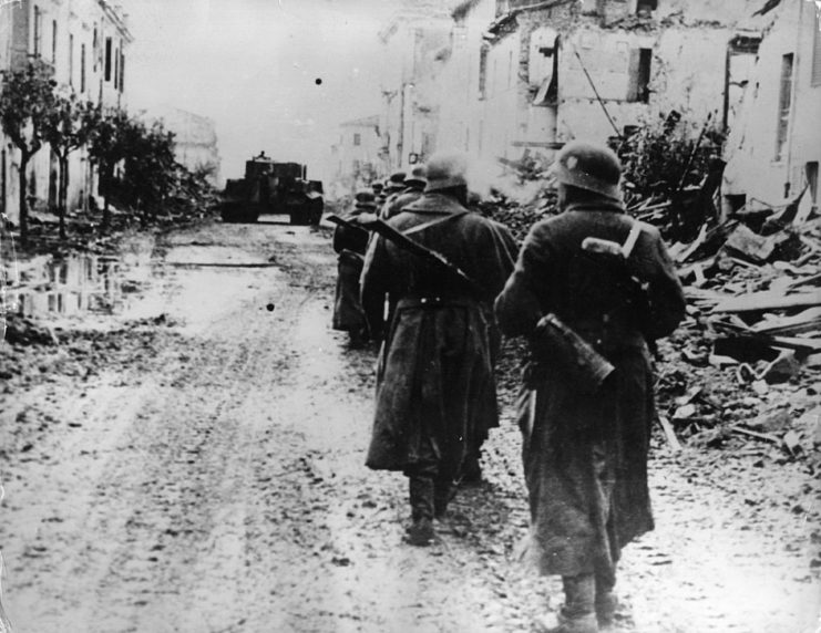 German soldiers walking through a city street