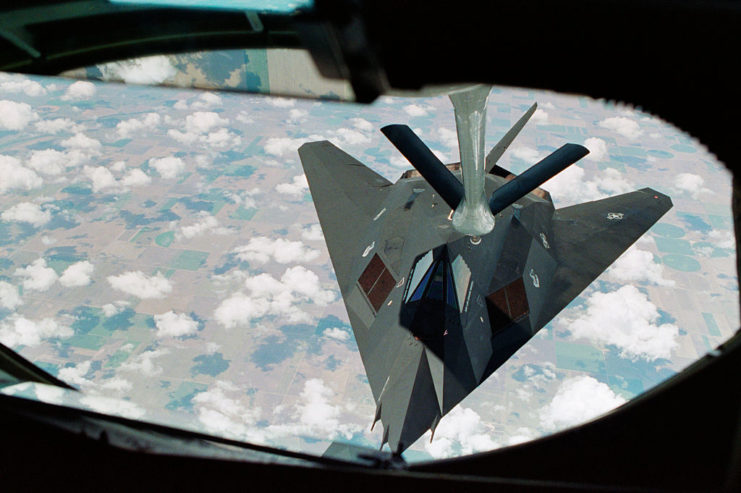 A F-117A Stealth fighter plane re-fuelling in the sky