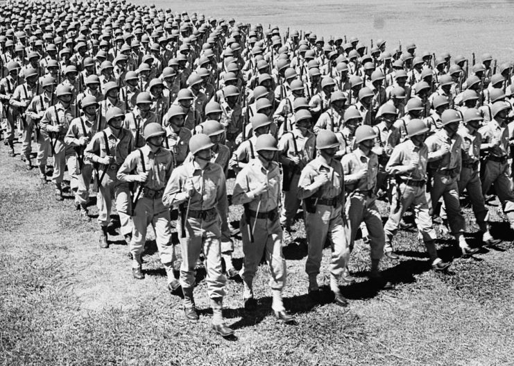 Rows of US soldiers marching