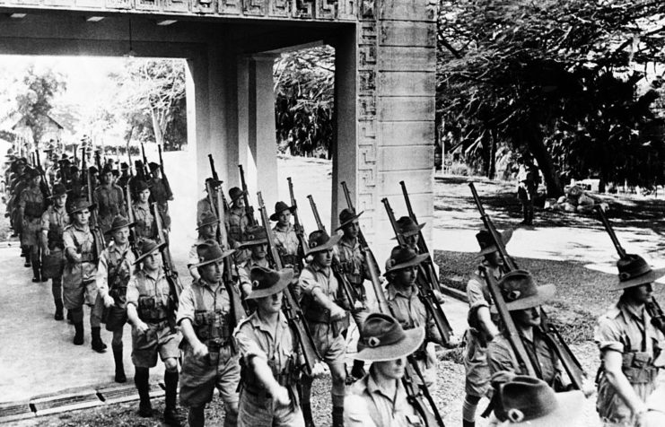Australian soliders marching in Malaya, circa 1941.