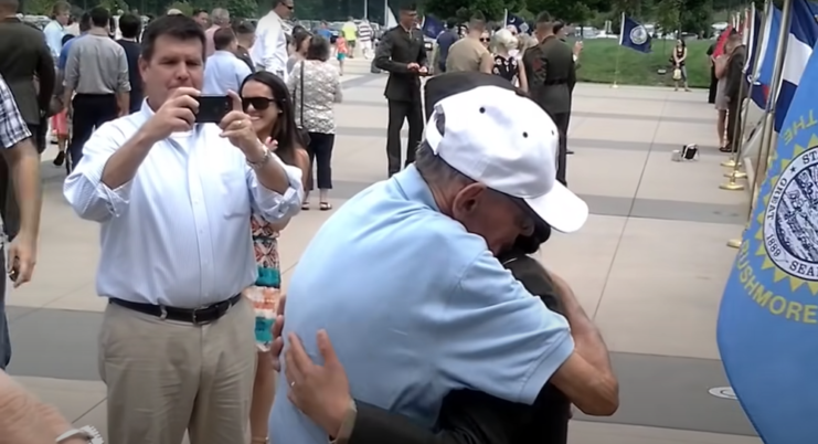 Staff Sgt. James Williams hugging 2nd Lt. Charlotte Williams