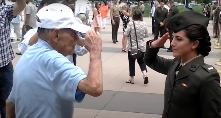 Staff Sgt. James Williams saluting 2nd Lt. Charlotte Williams