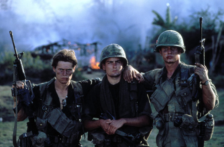 Tom Berenger, Charlie Sheen and Willem Dafoe in character for 'Platoon'