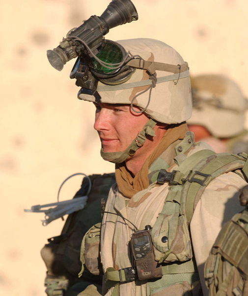 A US Marine wearing a high-tech kevlar helmet