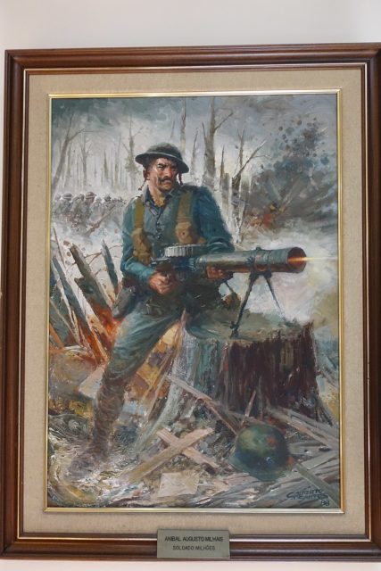 Painting of Aníbal Augusto Milhais firing his Lewis gun 
