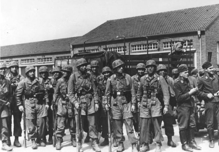German soldiers standing outside a building
