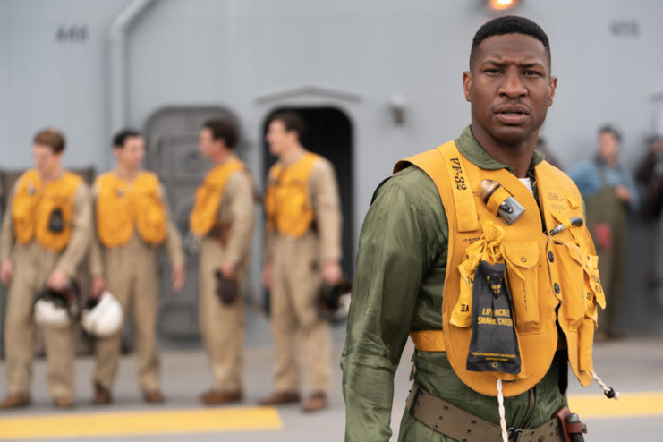 Jesse Brown, played by Jonathan Majors, in a flight suit.
