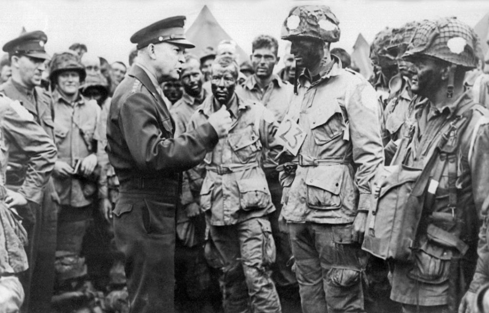Dwight D. Eisenhower speaking with paratroopers