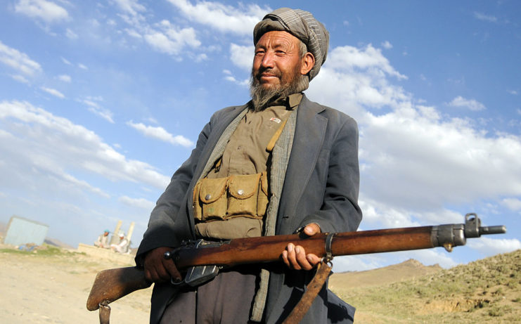 Afghan soldier holding a Lee-Enfield repeating rifle