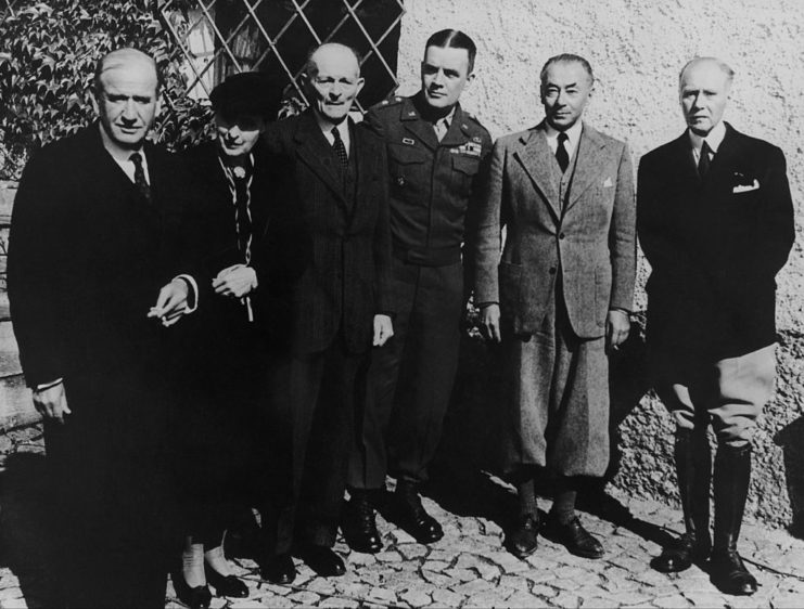 Survivors of Castle Itter standing outside the building