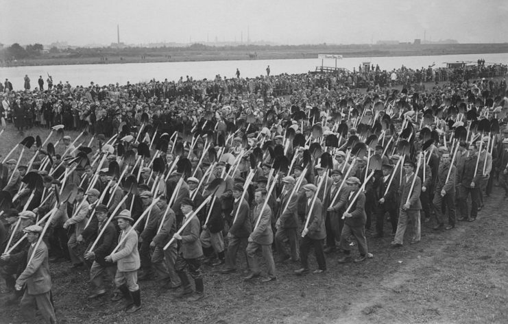 Construction workers marching together