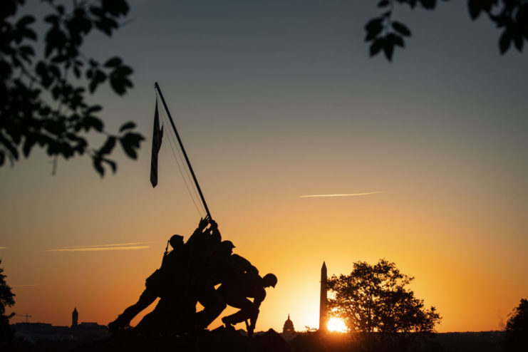 Sun setting behind the Iwo Jima Memorial