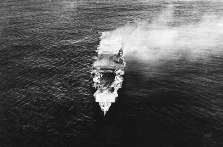 Hiryū shrouded in smoke while at sea