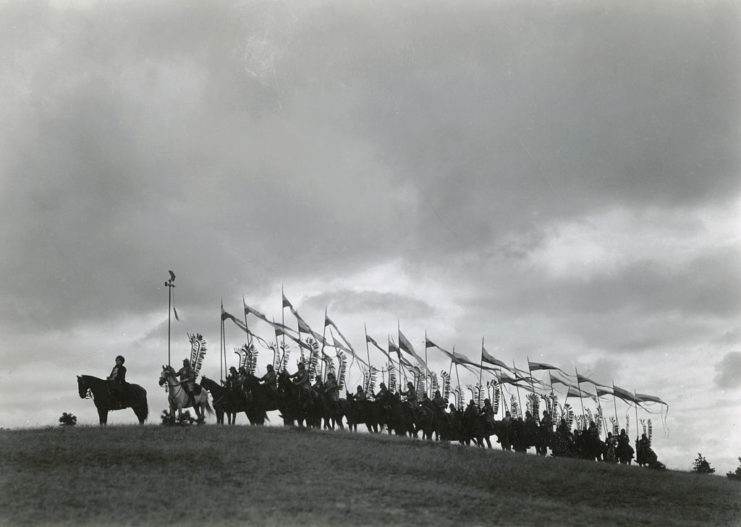 Members of the Polish Army sitting together on horseback