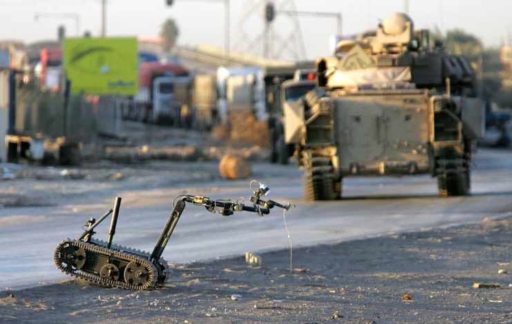 A remote-controlled bomb disposal unit in the middle of a road