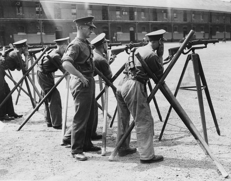Troops lined up behind Lee-Enfield repeating rifles