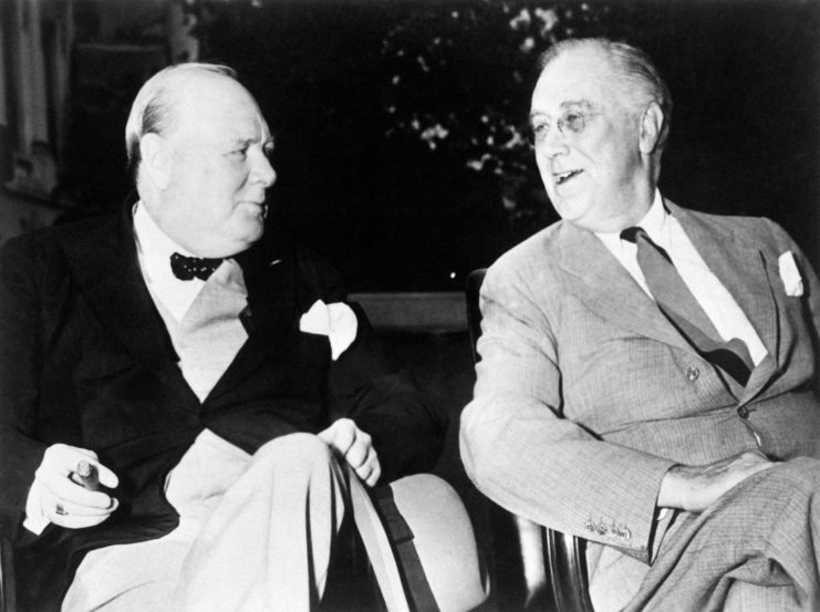 Winston Churchill sitting with Franklin D. Roosevelt
