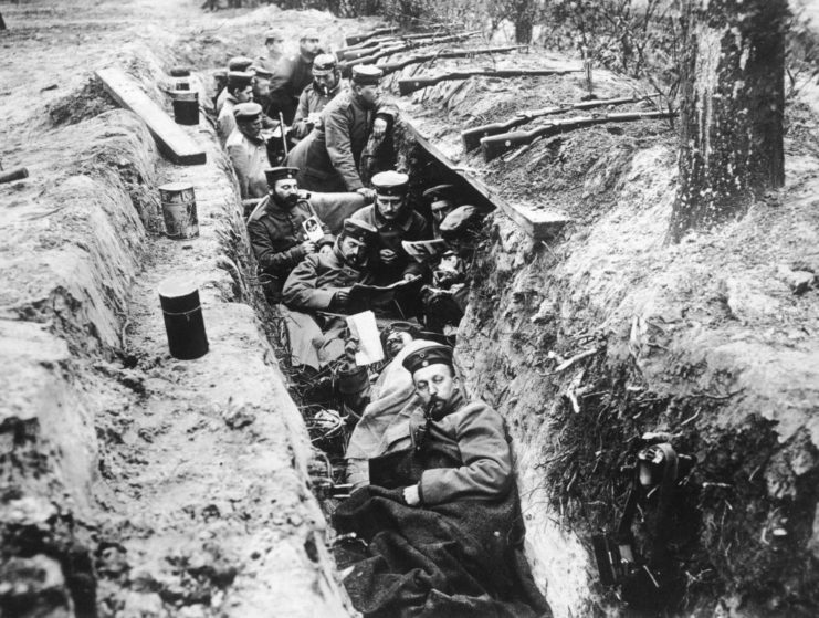 German soldiers sitting in a trench