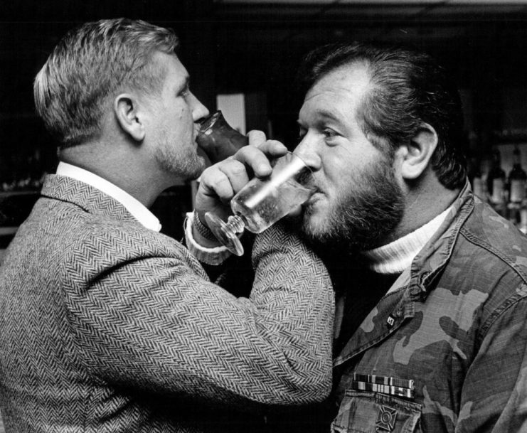Gary Wetzel and fellow Medal of Honor recipient Sammy L. Davis have a drink 