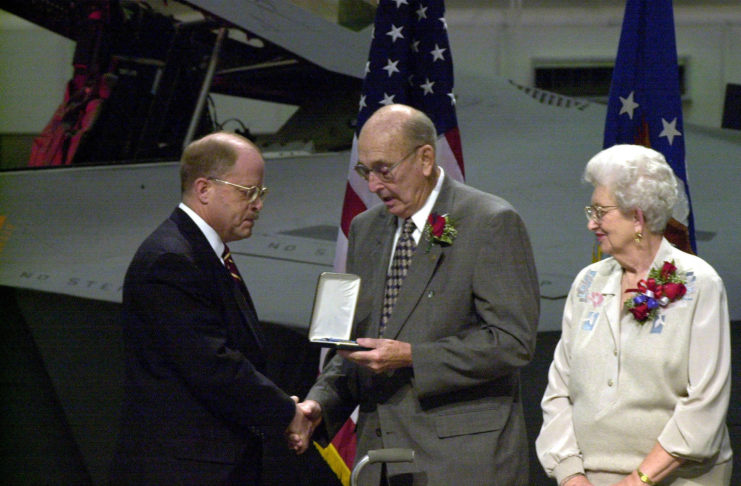 Whit Peters presenting the Medal of Honor to William F. and Alice Pitsenbarger