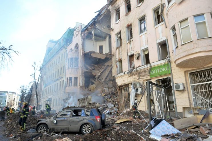 Damaged buildings along a city street