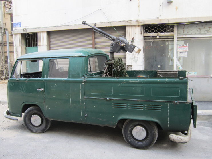 Pickup truck with a machine gun installed at the back