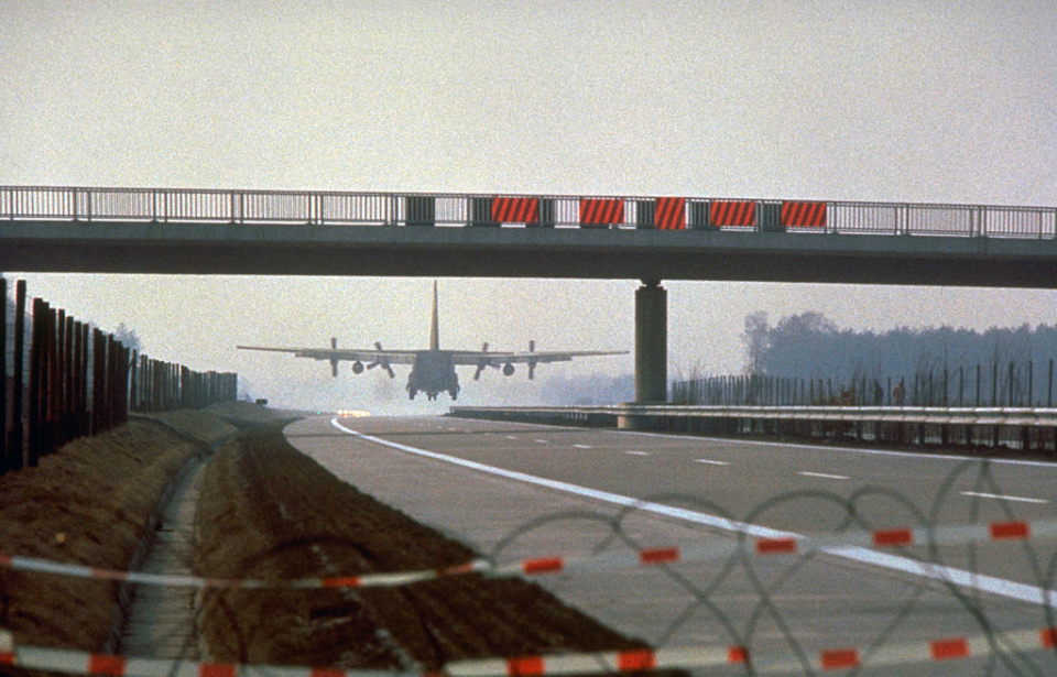 Airplane landing on a highway