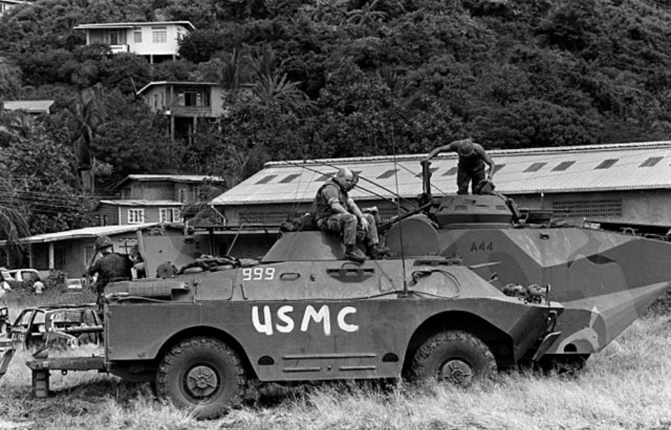 US Marines sitting on a captured Soviet-made BRDM-2 amphibious armored scout car