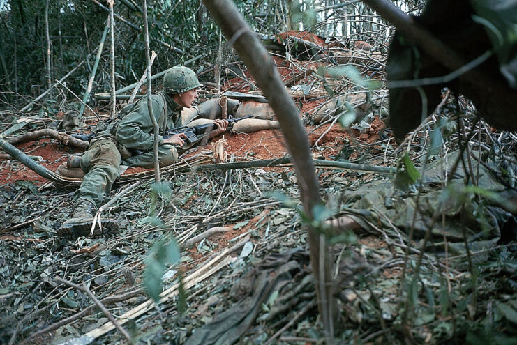 Members of the 173rd Airborne Division scaling Hill 875