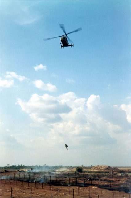 William H. Pitsenbarger being lowered from an HH-43F Huskie helicopter
