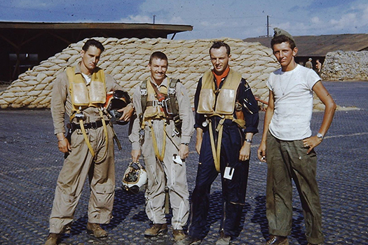 Charles Loring Jr. standing with three other airmen