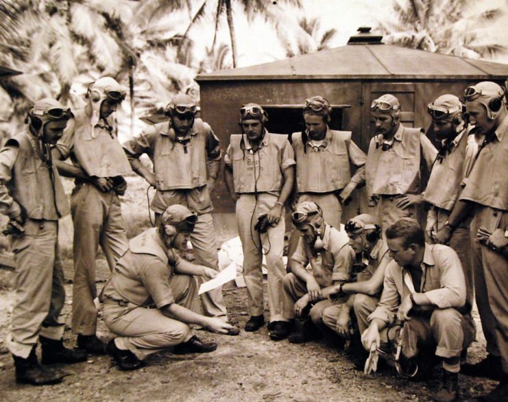 Gregory "Pappy" Boyington speaking with members of the Black Sheep Squadron